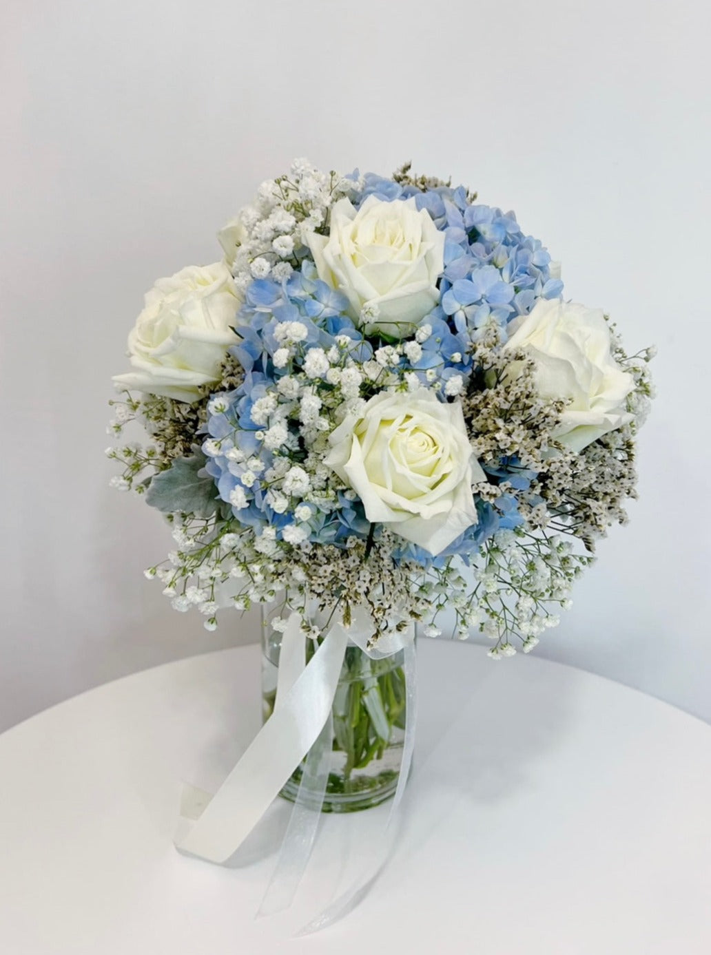 Roses and Blue Hydrangea Bouquet