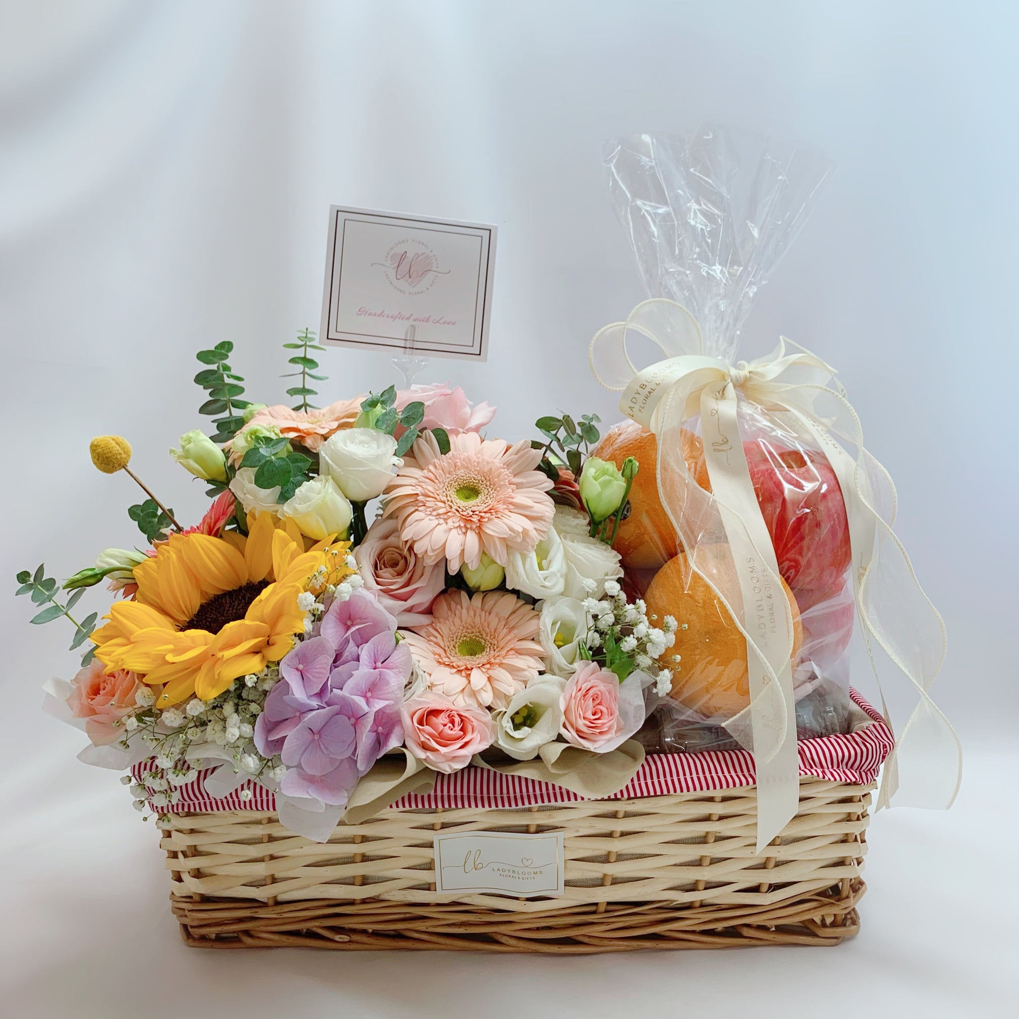 Fruits Basket with Premium Flowers Arrangement