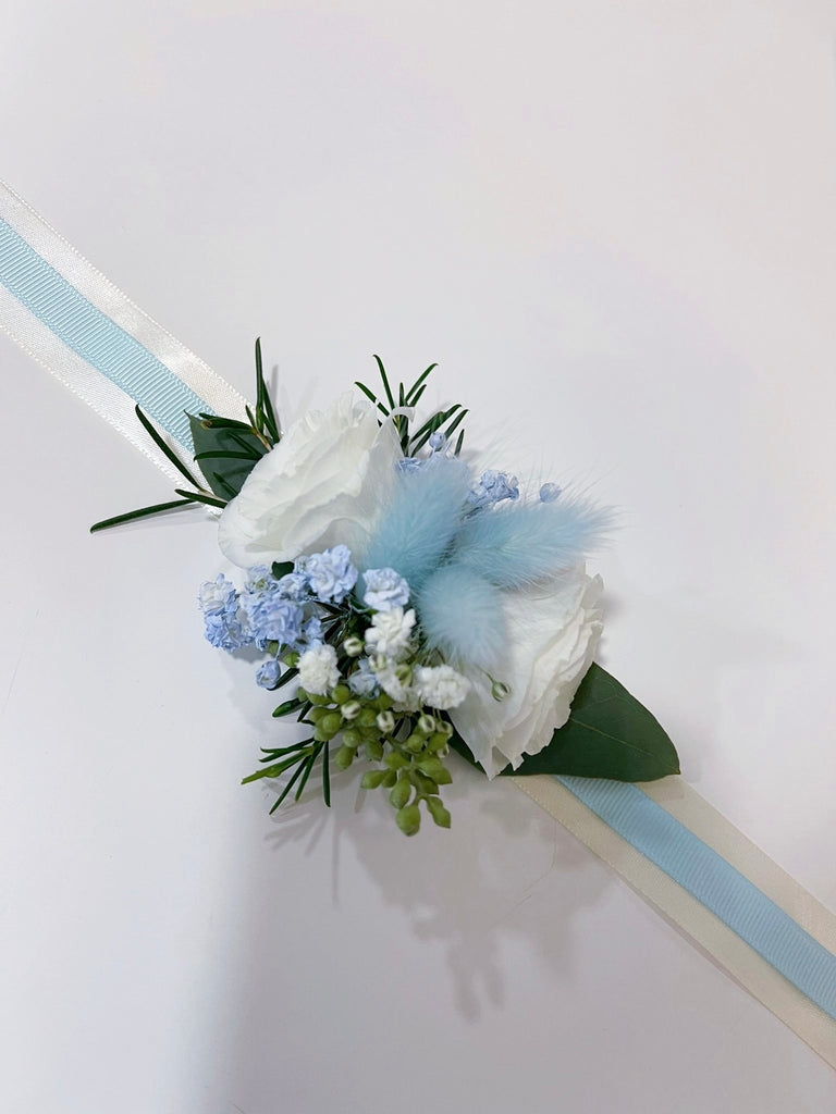 Light blue shop wrist corsage